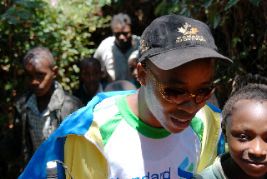 Henry making a tour in the village with the kids