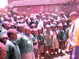Henry giving motivational talk to the student of Kiragari primary schoolA